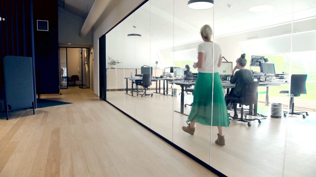 Rebel work space with working employees sitting by their computers