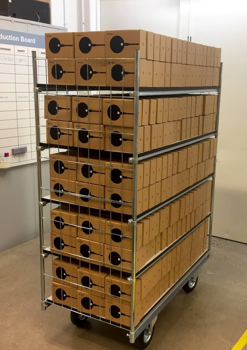An industrial trolley filled with Airtame 2 devices ready for shipment